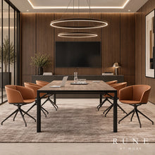 Load image into Gallery viewer, A modern conference room setup featuring a rectangular wooden table surrounded by six brown Rune swivel chairs, set on a large textured gray rug. The background consists of dark wood-paneled walls with a large black wall-mounted screen, a sideboard, and two prominent circular ring pendant lights hanging above the table.