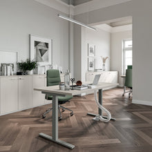 Load image into Gallery viewer, Spire Height Adjustable Desk in Modern Studio Style Office Space