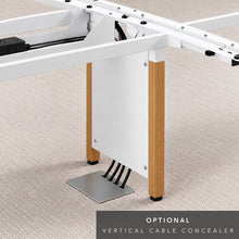 Load image into Gallery viewer, A Vertical Cable Concealer Channeling Wires from a Cable Tray to the Floor
