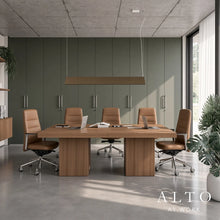 Load image into Gallery viewer, Alto office chairs in leather finish around a modern luxury meeting room table
